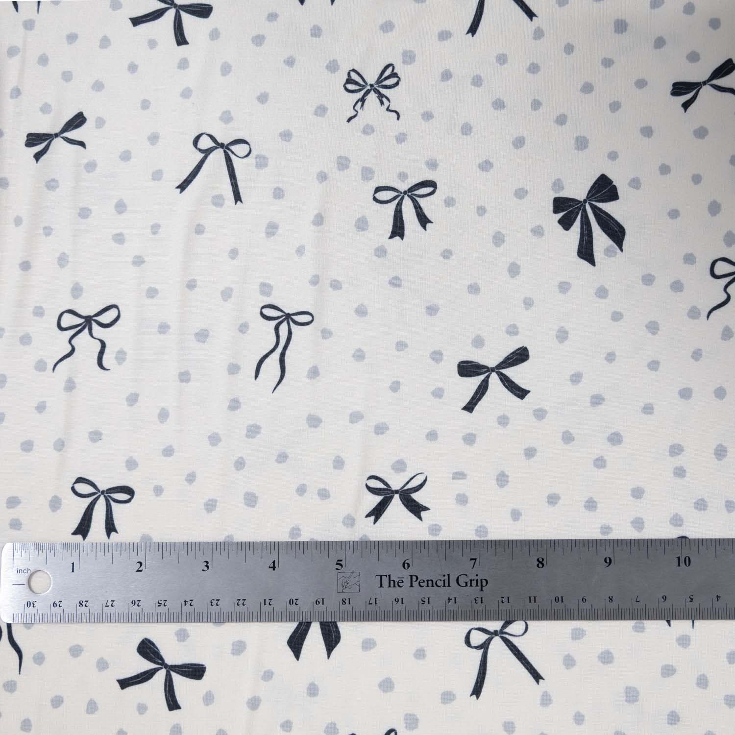 Double Brushed Poly - Bows & Dots