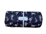 Remnant - Swiss dot knit, black with purple floral, 4 1/4 yd. @ $7.70/yd.